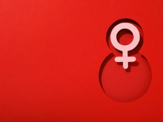 Number eight cut out of paper on a red background